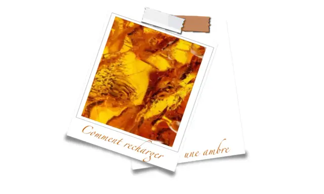 Gros plan sur une pièce d'ambre aux reflets dorés et orangés, sur fond blanc.